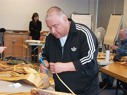Wayne Bell teaches a cedar weaving workshop at the Museum at Campbell River.